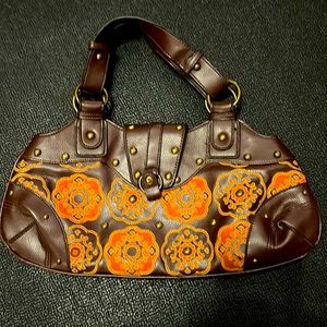 Used hand bag brown and orange